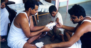 Dr.Prakash Amte Treating Tribals